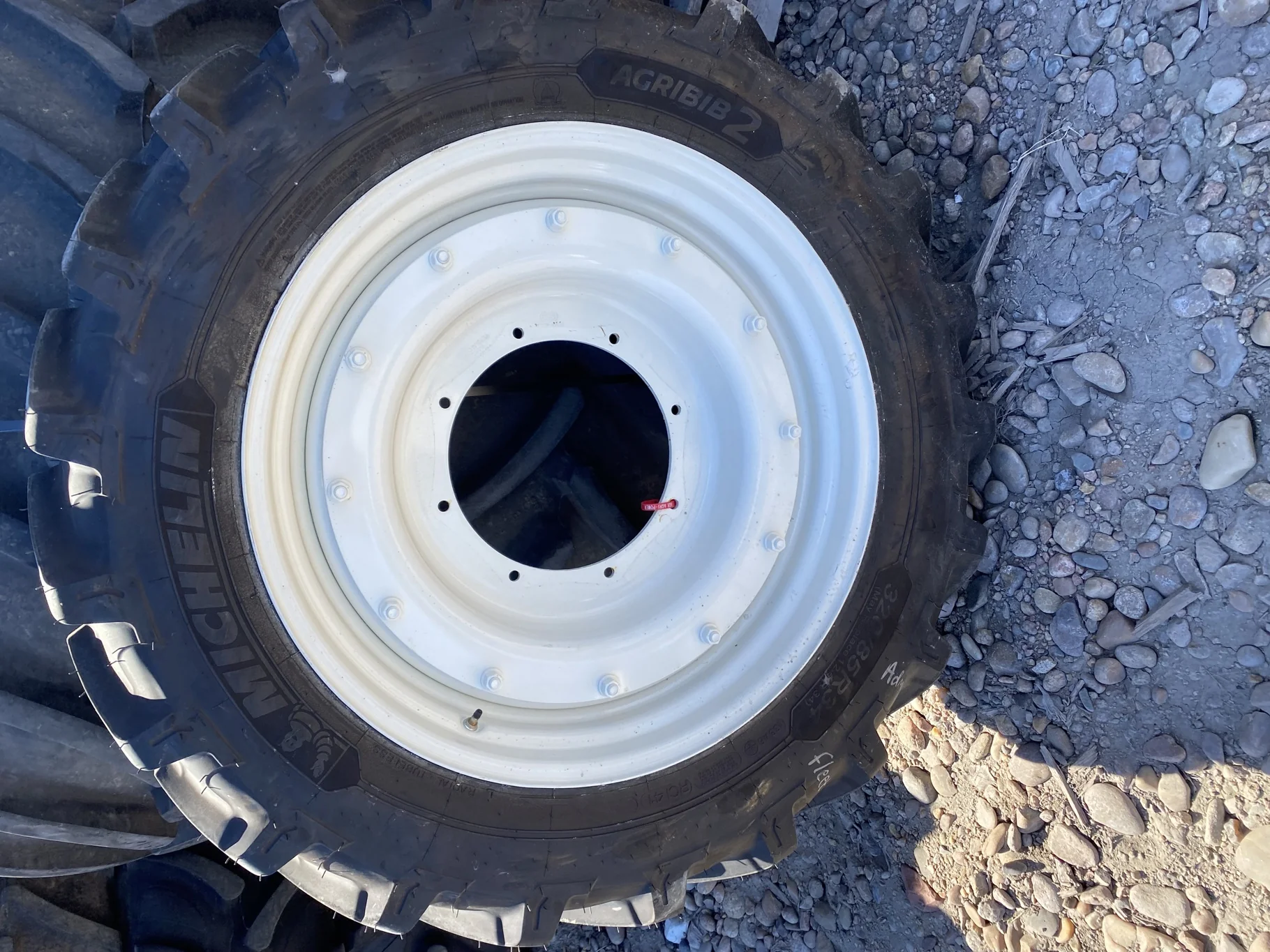 Take-Off 320/85R34 (12.4R34) Michelin AgriBib 2 R-1W 133A8/133B TL on a 10 X 34 NH White 12 bolt wh