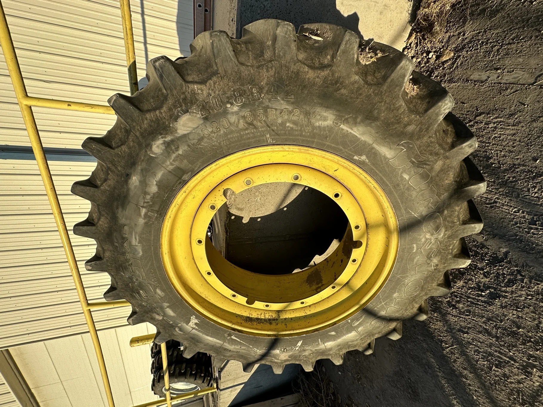 Used 520/85R42 Firestone Radial Deep Tread 23 R-1W (157B) TL 65% on 18 X 42 JD Yellow 12-32.047 3.19
