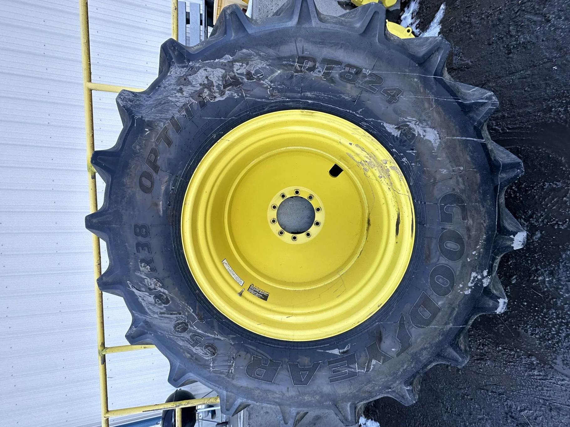 Used 650/85R38 Goodyear Optitrac 173D R-1W TL 90% on a 23 x 38 JD Yellow 10 Bolt Outside Dolly image 2