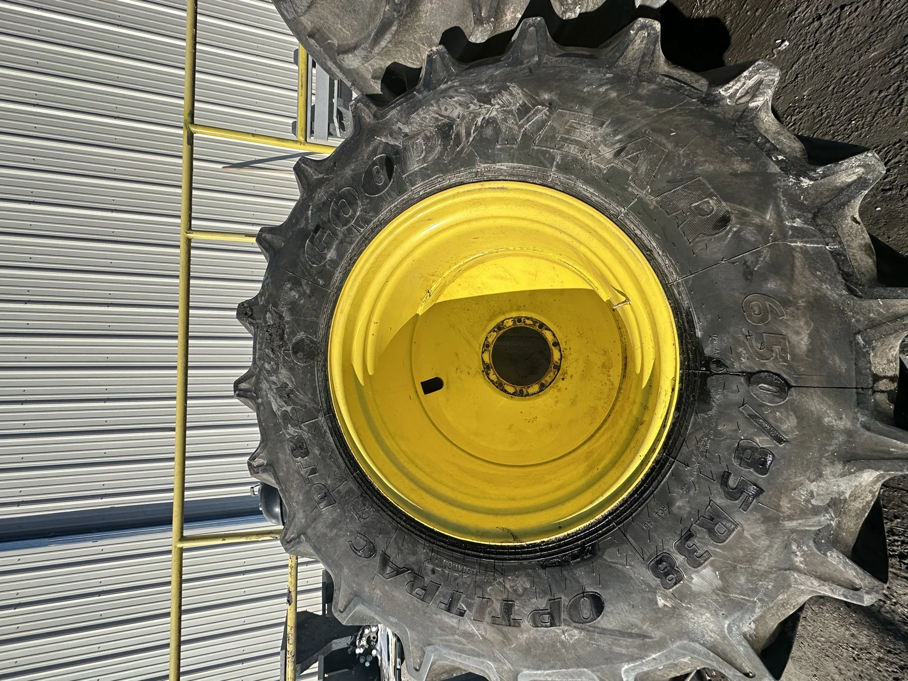 Used 650/85R38 Goodyear Optitrac 173D R-1W TL 90% on a 23 x 38 JD Yellow 10 Bolt Inside Dolly image 2
