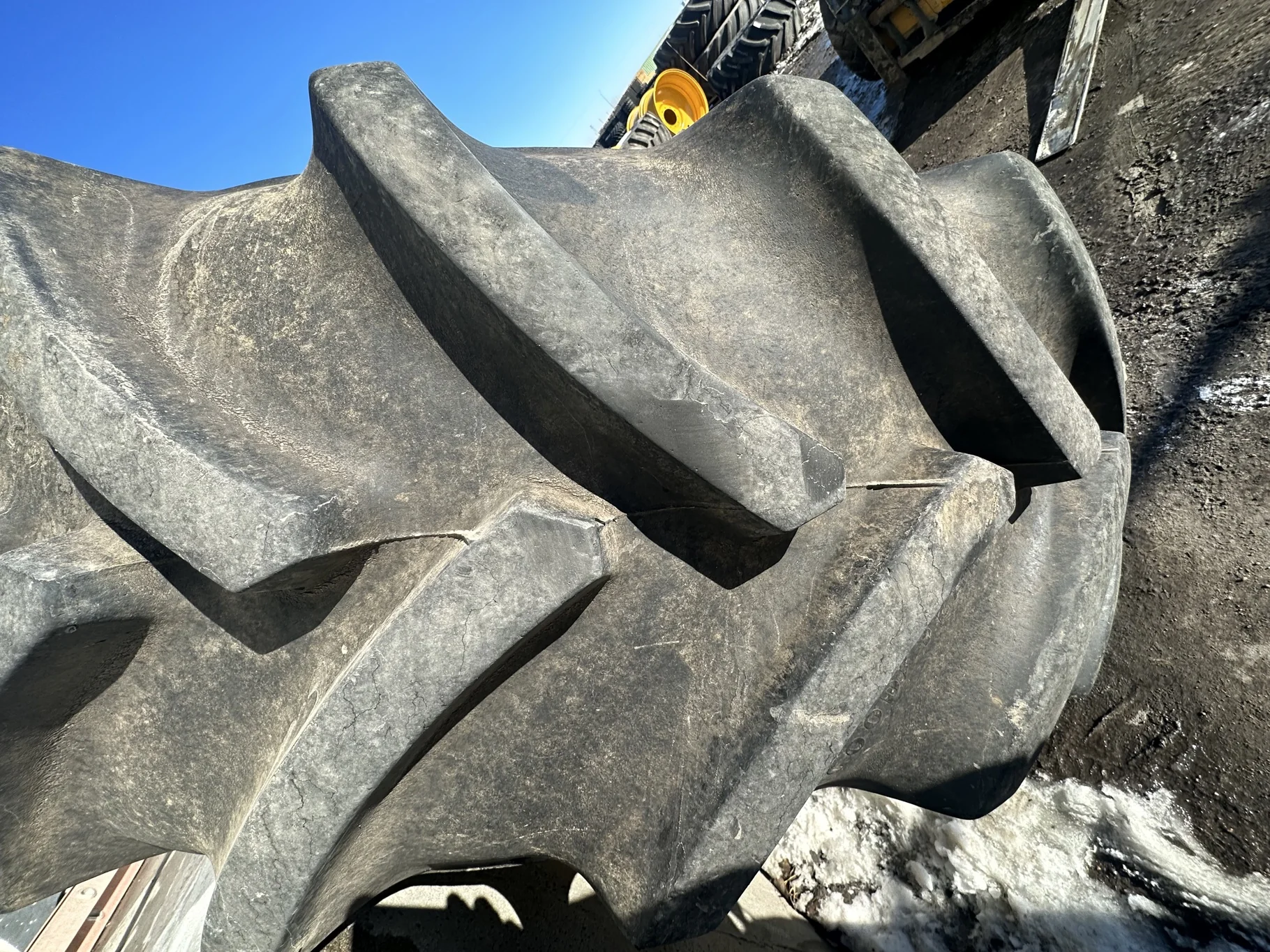 Used 650/85R38 Goodyear Optitrac 173D R-1W TL 90% on a 23 x 38 JD Yellow 10 Bolt Inside Dolly image 4