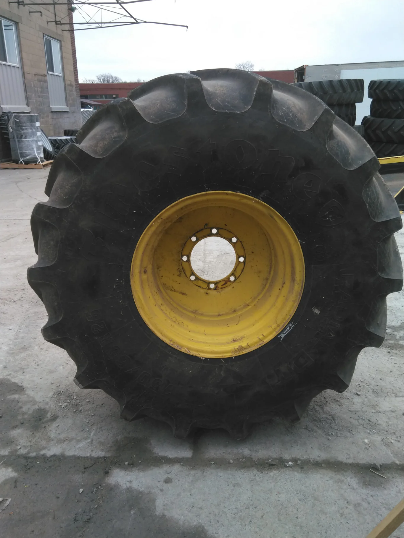 Used 750/65R26 169B Firestone RDT AT TL R-1W 70-75% On 25x 26 8-10.82-8.78 11"BS Titan Yellow Dolly