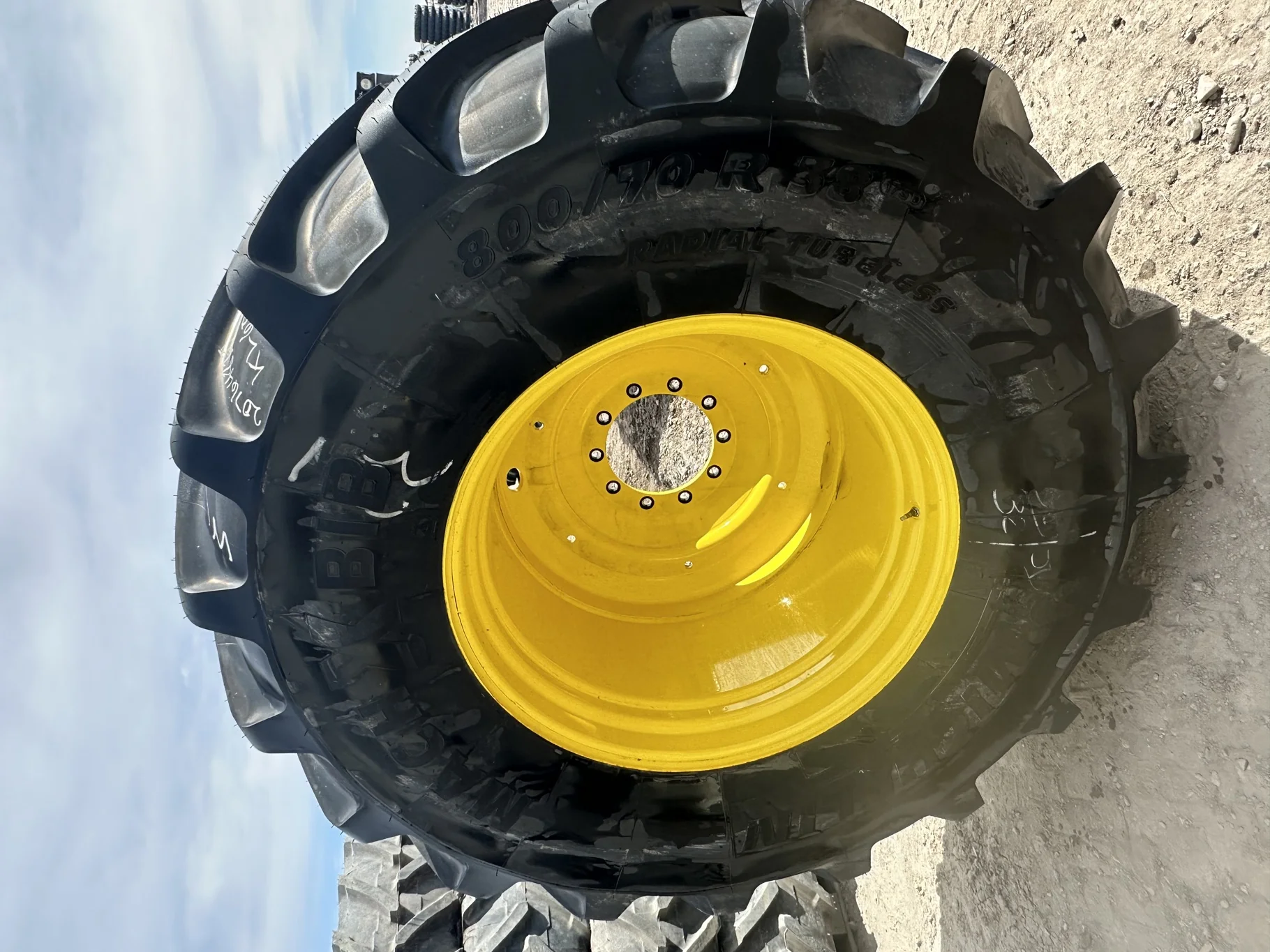 Take-Off 800/70R38 Michelin MachXBib R-1W 173D TL on a 27 X 38 JD Yellow 10 Bolt (.937) 5/8" F