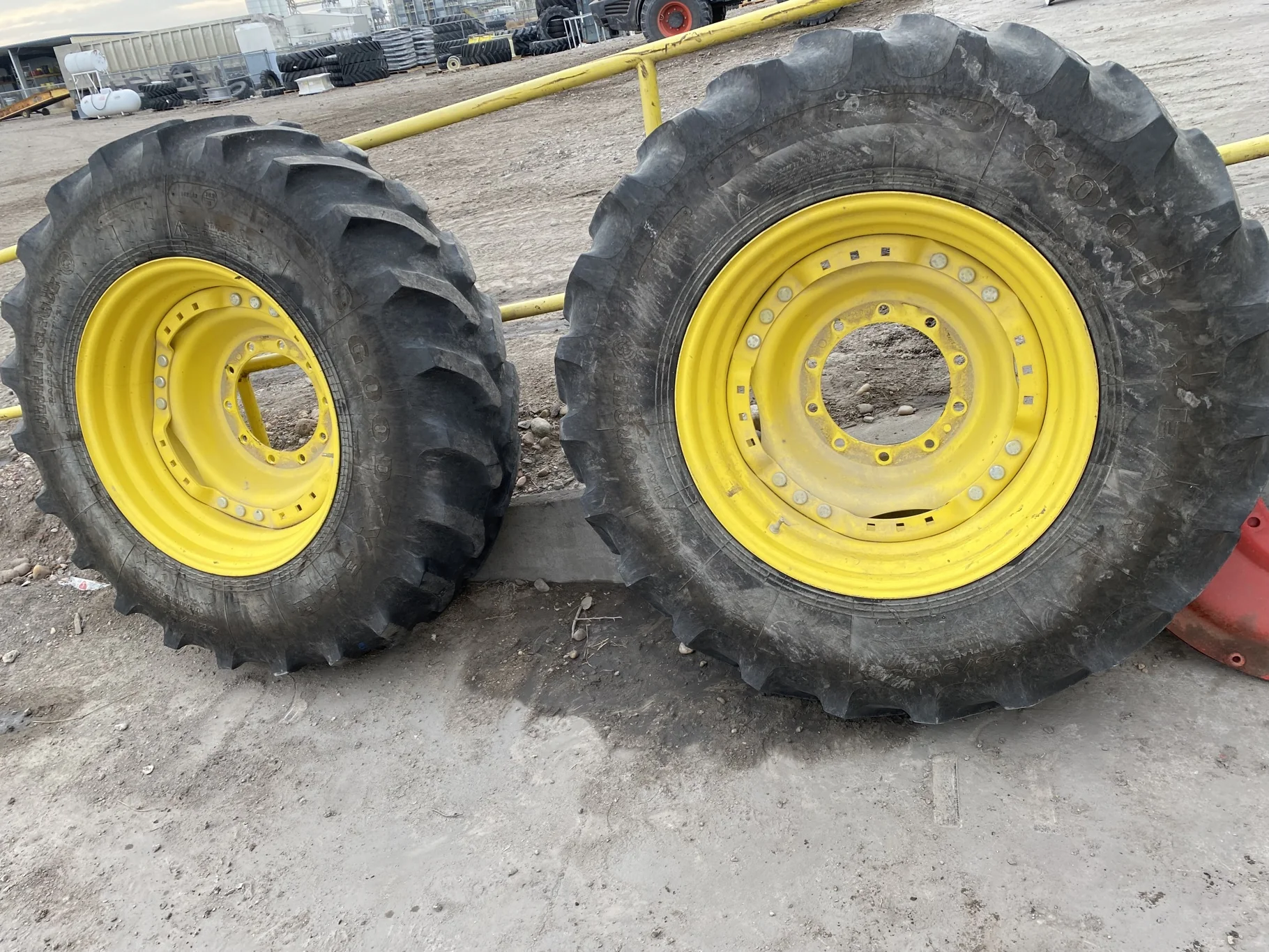 Used 420/90R30 Goodyear Ultra Torque Radial DT 712 (142A8/B) R-1 TL 36% on a 15 x 30 JD Yellow