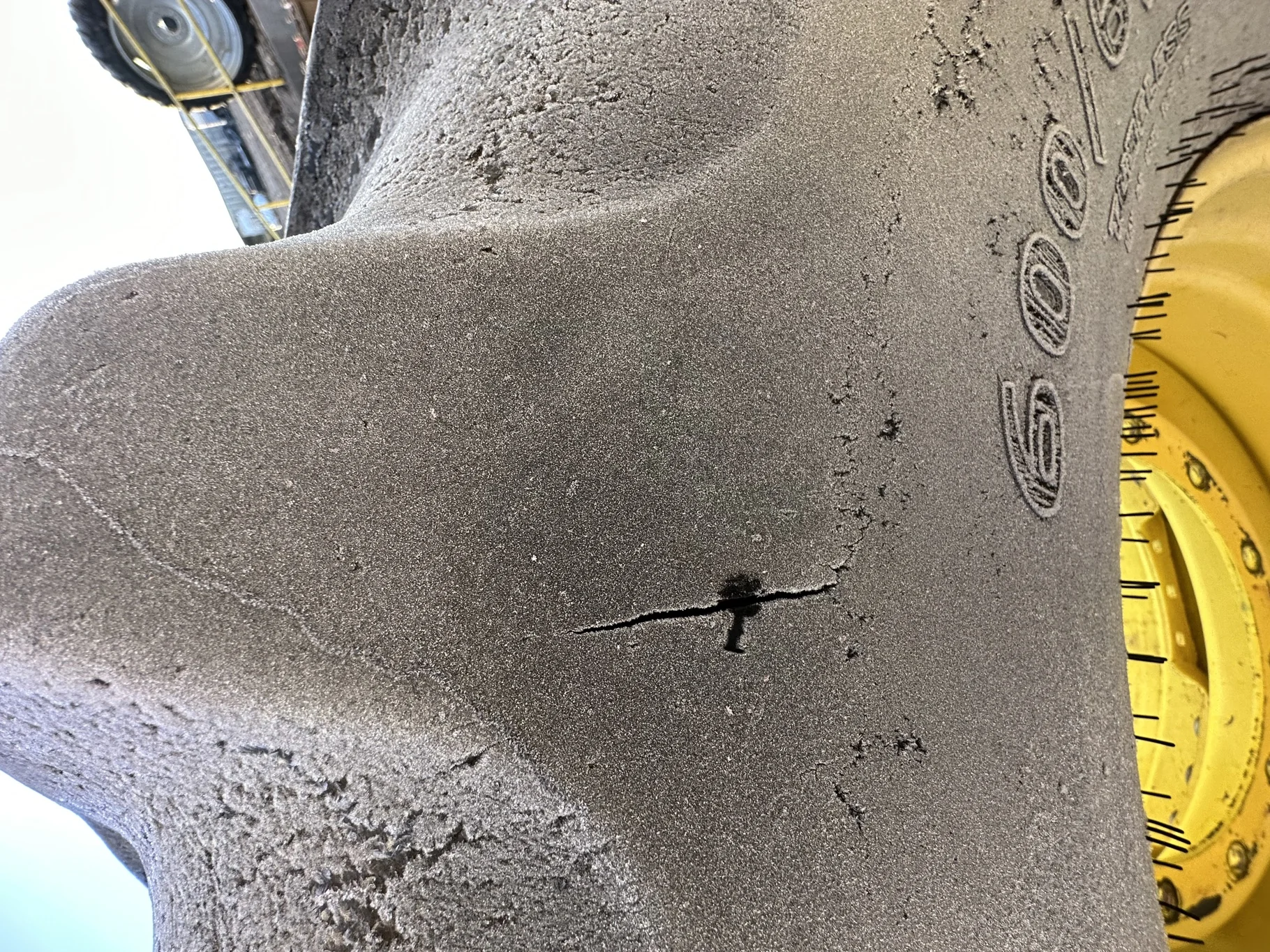 Used 600/65R28 Goodyear Optitrac (147B) R-1W TL 60% on a 18 X 28 JD Yellow Waffle 12-16.732 4" offse image 8