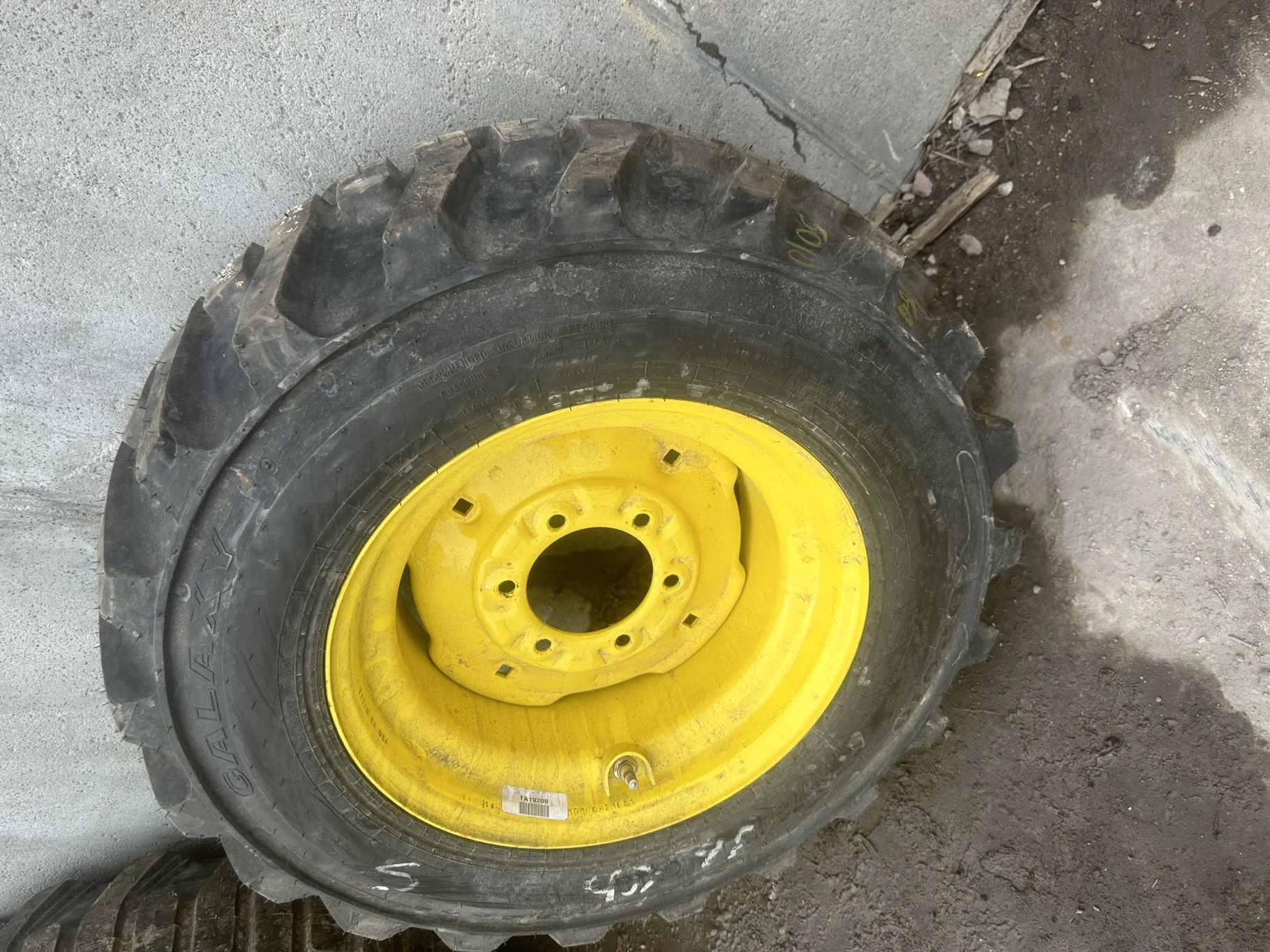 TAKE-OFF 10-16.5 Galaxy XD2010 R-4 C(6Ply) TL on a 8.25 X 16.5 JD Yellow 6 Bolt Implement Whee