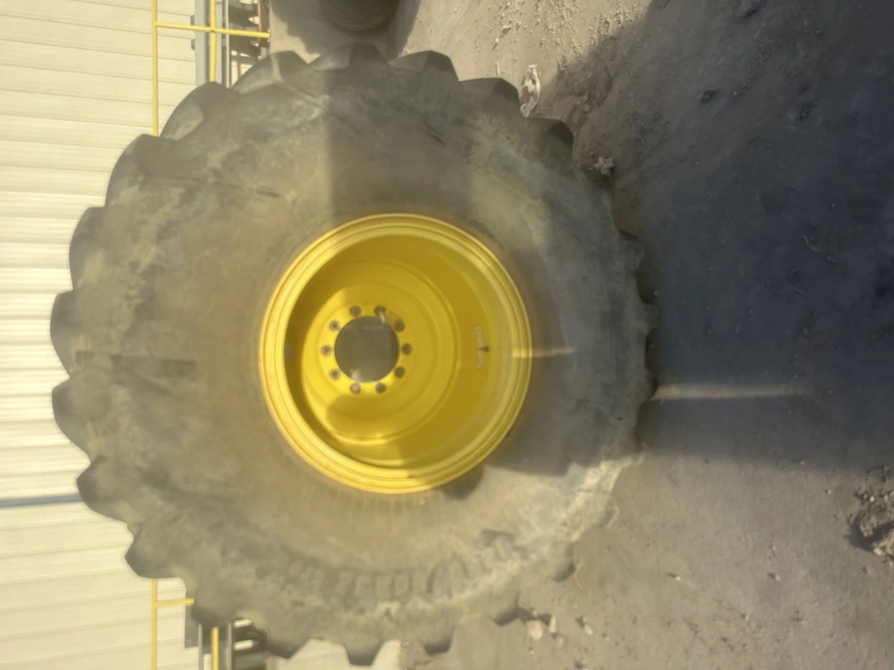 Used IF1250/50R32 CFO Firestone Radial Deep Tread 23 R-1W (201B) TL 90% on a 44 x 32 JD Yello image 2