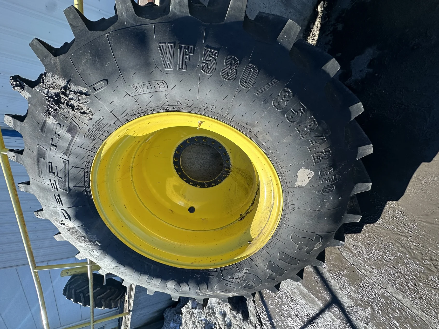Used VF580/85R42 CFO Firestone Radial Deep Tread 23 R-1W 178B TL 95% on a 18 X 42 XE Series  JD