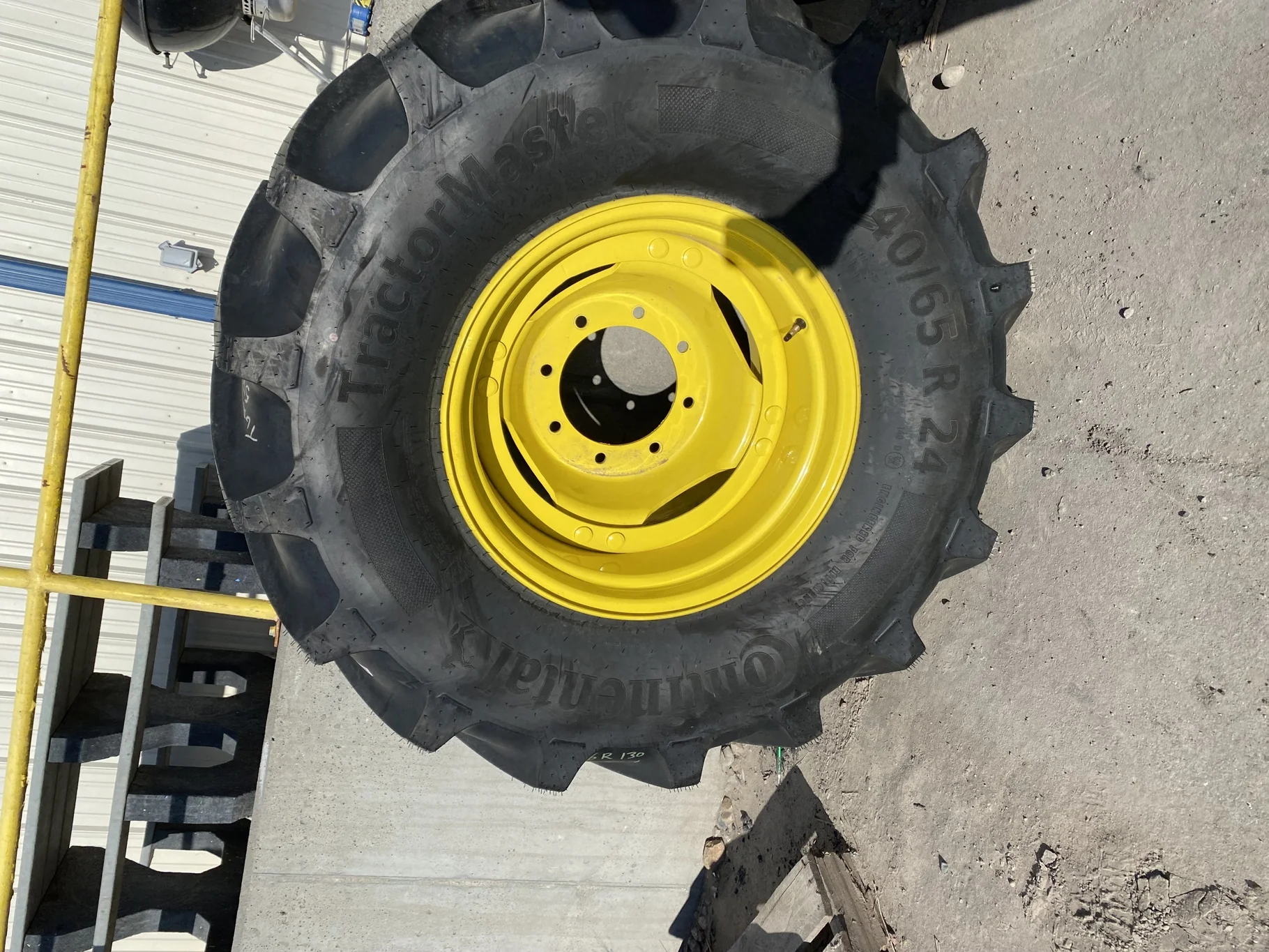 Used 540/65R24 Continental TractorMaster R-1W 140D 98% on 16 x 24 8-10.82-8.78 JD Yellow 24" Disc