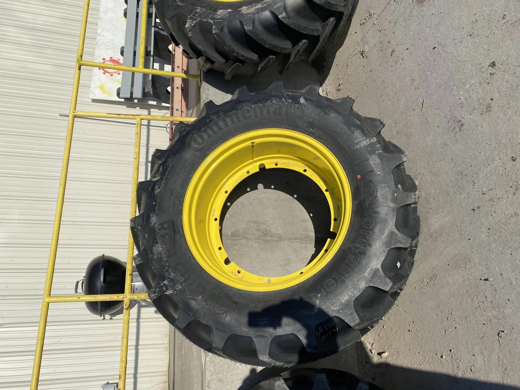 Take-Off 600/65R38 Continental TractorMaster R-1W 153D  TL on a 18 X 38 JD Yellow 12 Bolt (.93