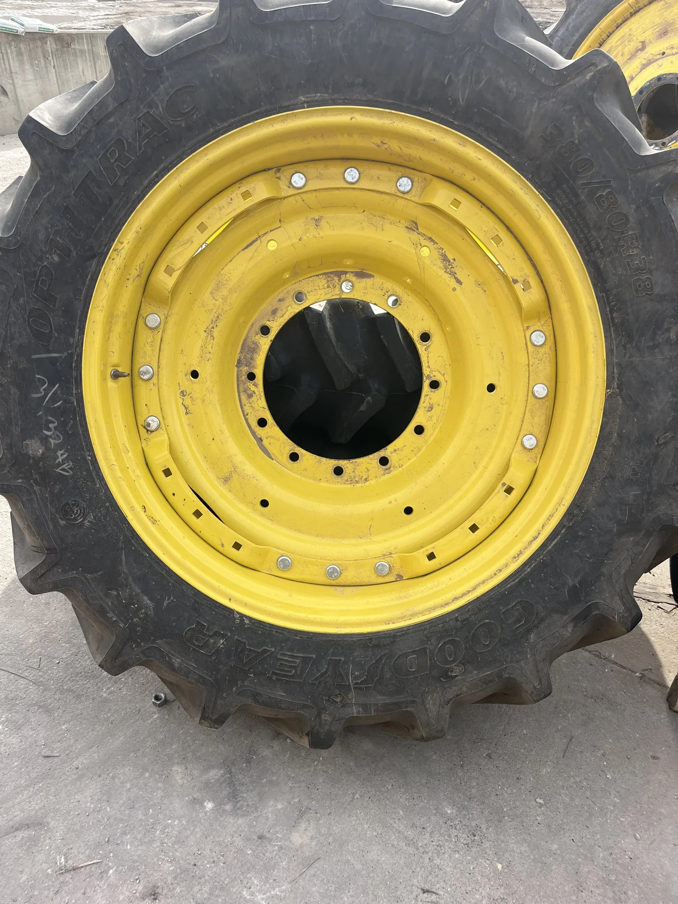Take-off 380/80R38 142D Goodyear Optitrac TL R-1W 95-100% On 12 x 38 24-29.5 3 Bolt Waffle Wheel