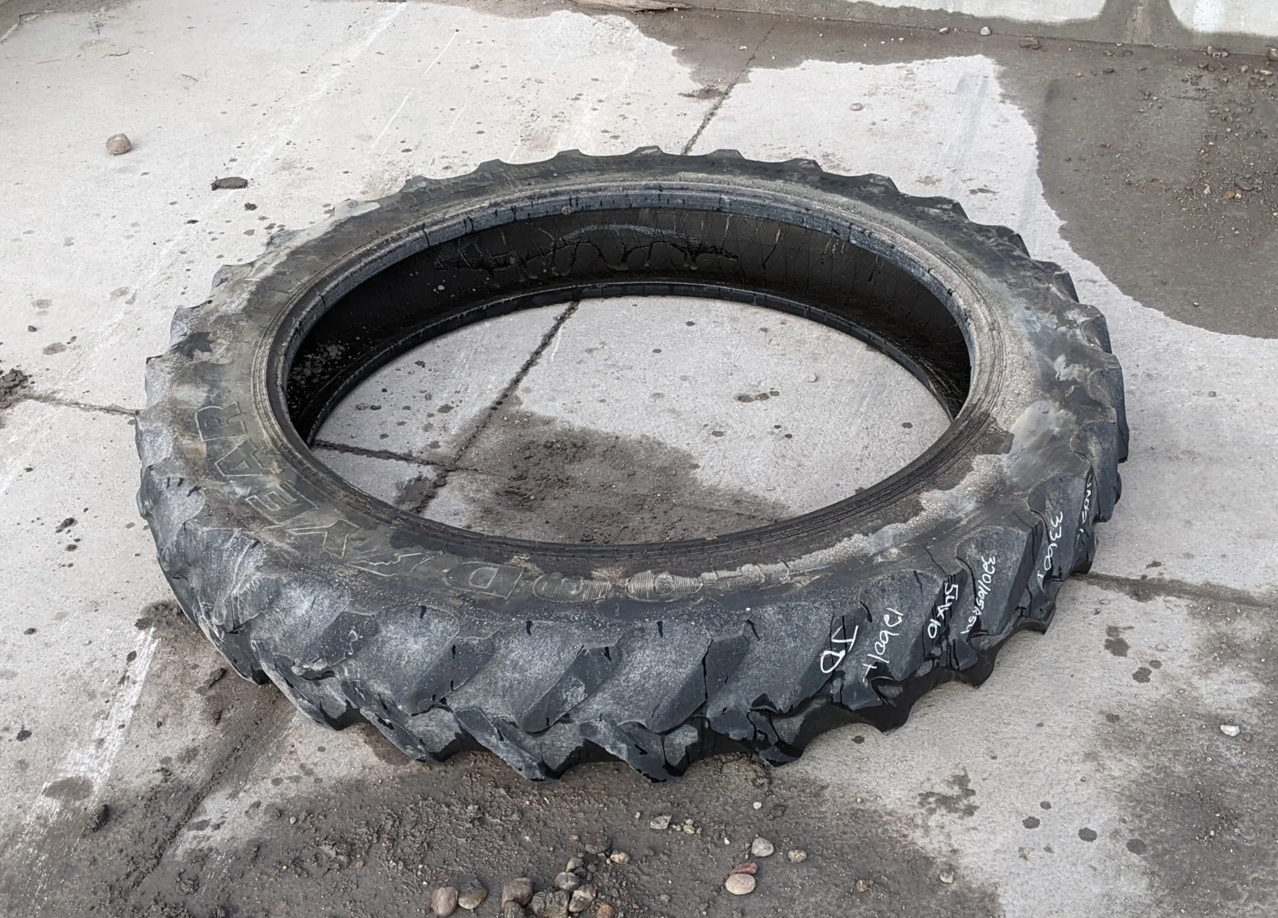 Used 320/80R42 Titan 49V R-1W (141B) TL 40% (uneven road wear, minor stubble forming on top of lugs)