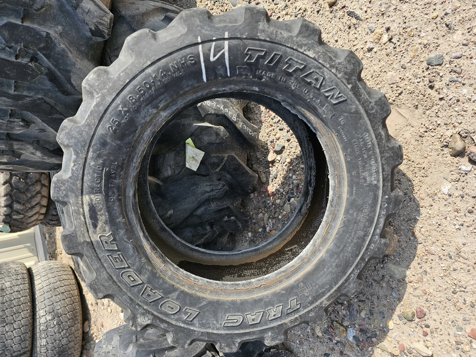 Used 50% 25x8.50-14 Titan Trac Loader R-4 6 Ply - Fair Condition (Lug Cuts, Road Wear, Bead image 3