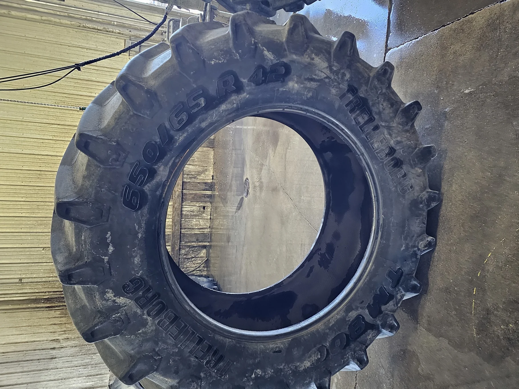 Used 650/65R42 Trelleborg TM800 High Speed R-1W 158D TL 75% (Stubble, Weathering Between Lugs, Lug C image 3