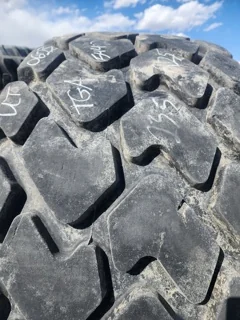 Used 23.5R25 Titan MXL 195A2 TL 70% - Fair Condition (Stubble, Lug Cuts, Sidewall Cuts) image 3