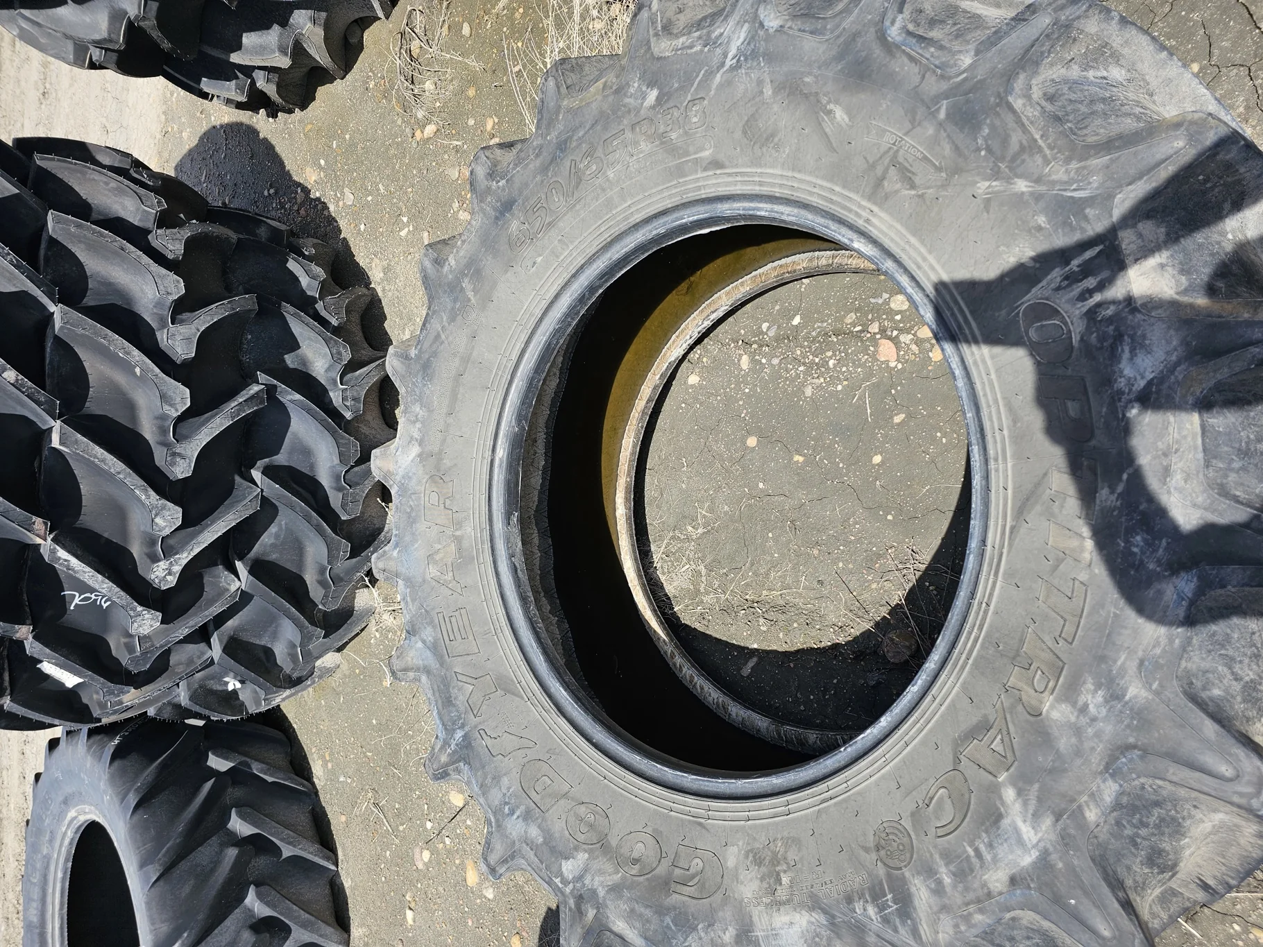 Used 650/65R38 Goodyear Optitrac R-1W (166D) TL 90% (Stubble, Lug Cuts, Slight Weathering) - Good Co