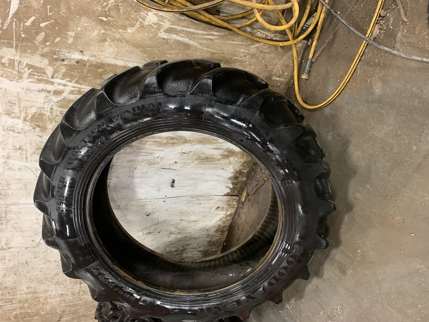 Used 380/80R38 Goodyear Super Traction DT800 R-1W (142A8/B) 30% - Fair Condition ( Lug Cuts, Stubble