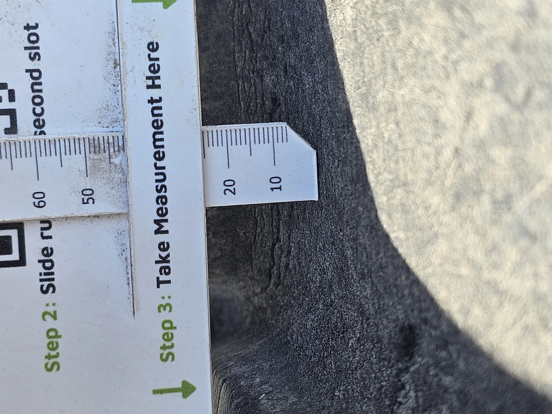 Used 23.5-25 Akuret E-2/L-2 16 ply 50% weathering, Stubble, Sidewall cuts, Lug Chunks missing, Lug c image 6
