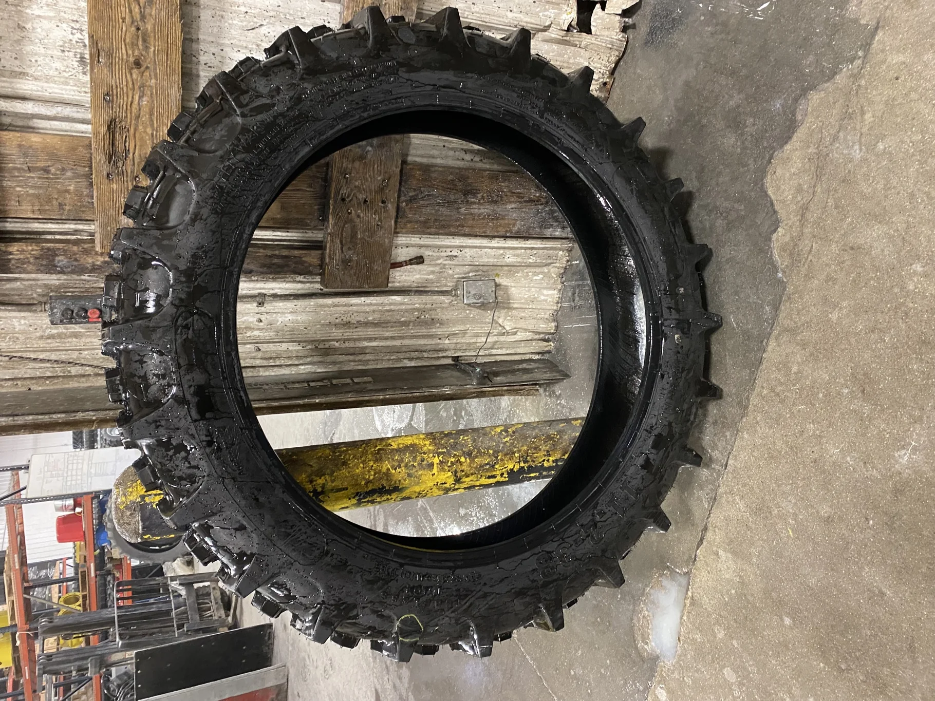 USED 11.2-38 Farmboy Agri Storm 2 95-100% Has chunk missing out of tread