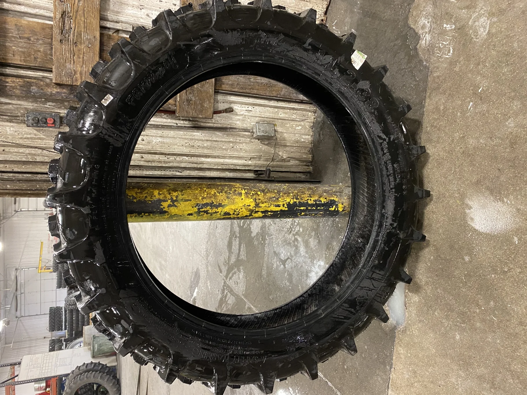 USED 11.2-38 Farmboy Agri Storm 2 95-100% Has chunk missing out of tread image 5