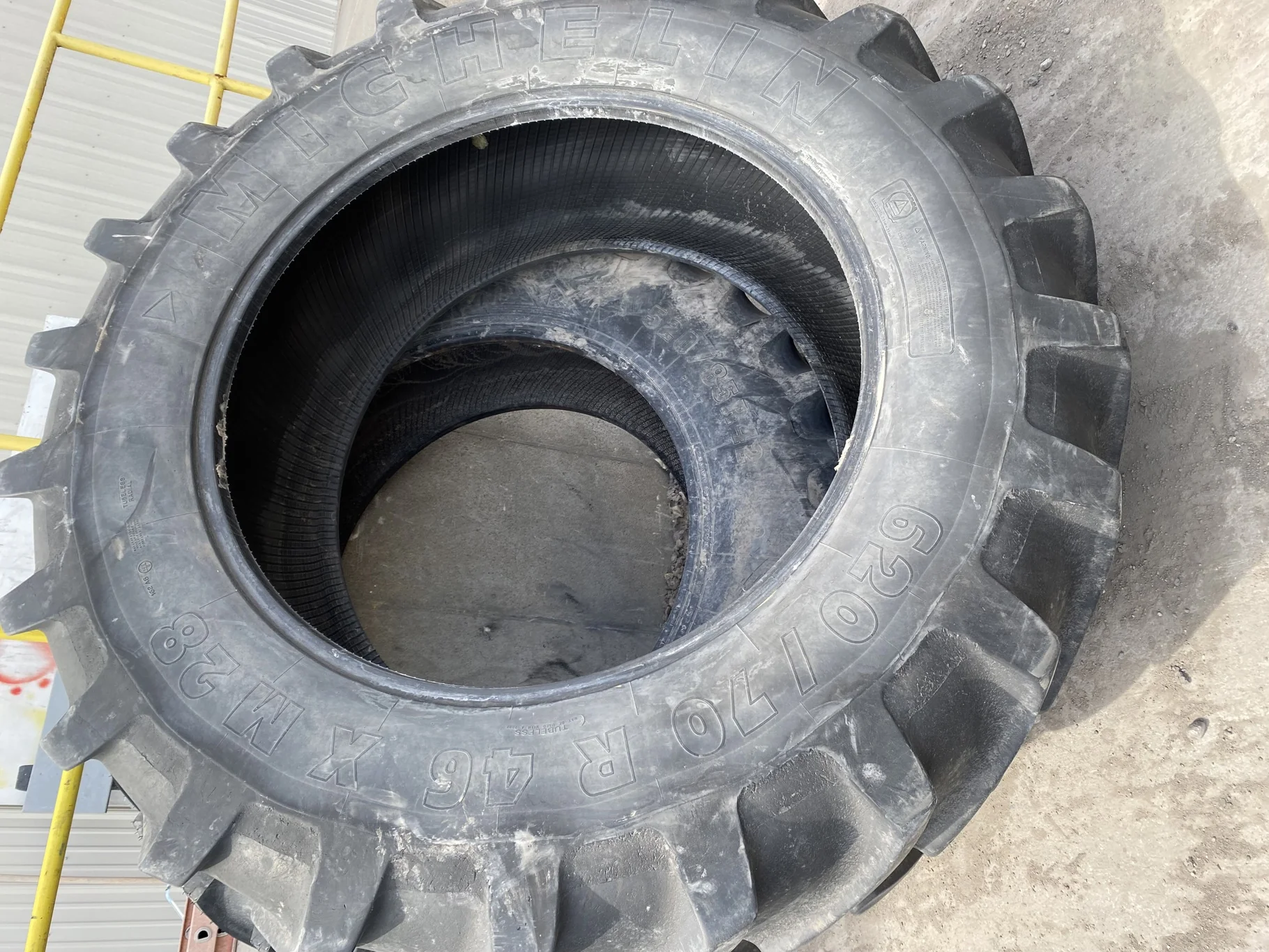 Used 620/70R46 Michelin XM28 162A8 TL 72% (sidewall stubble, road wear, weathering, between tread cu image 2
