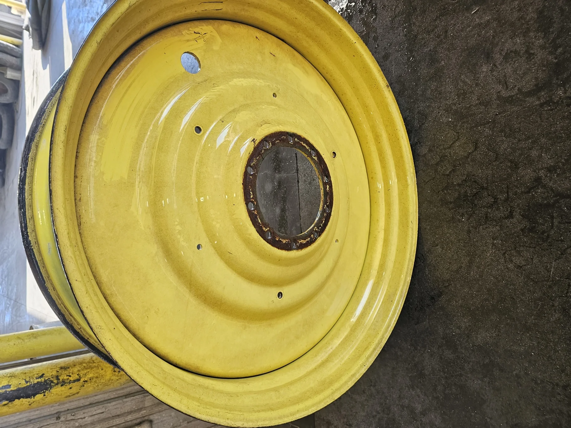 Used 15 X 50 JD Yellow 10 Bolt (.906) Dual Wheel (10-13.189-11.07) -6.38" IN w/.799 weight holes
