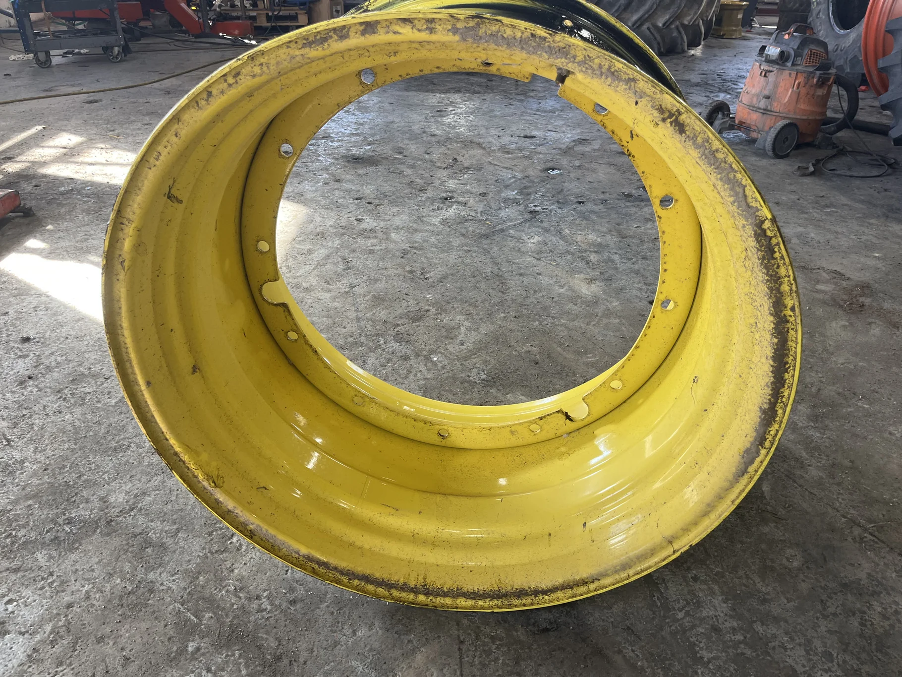 Used 23 X 38 12-32.047-30.079 Yellow Stub Disc Wheel