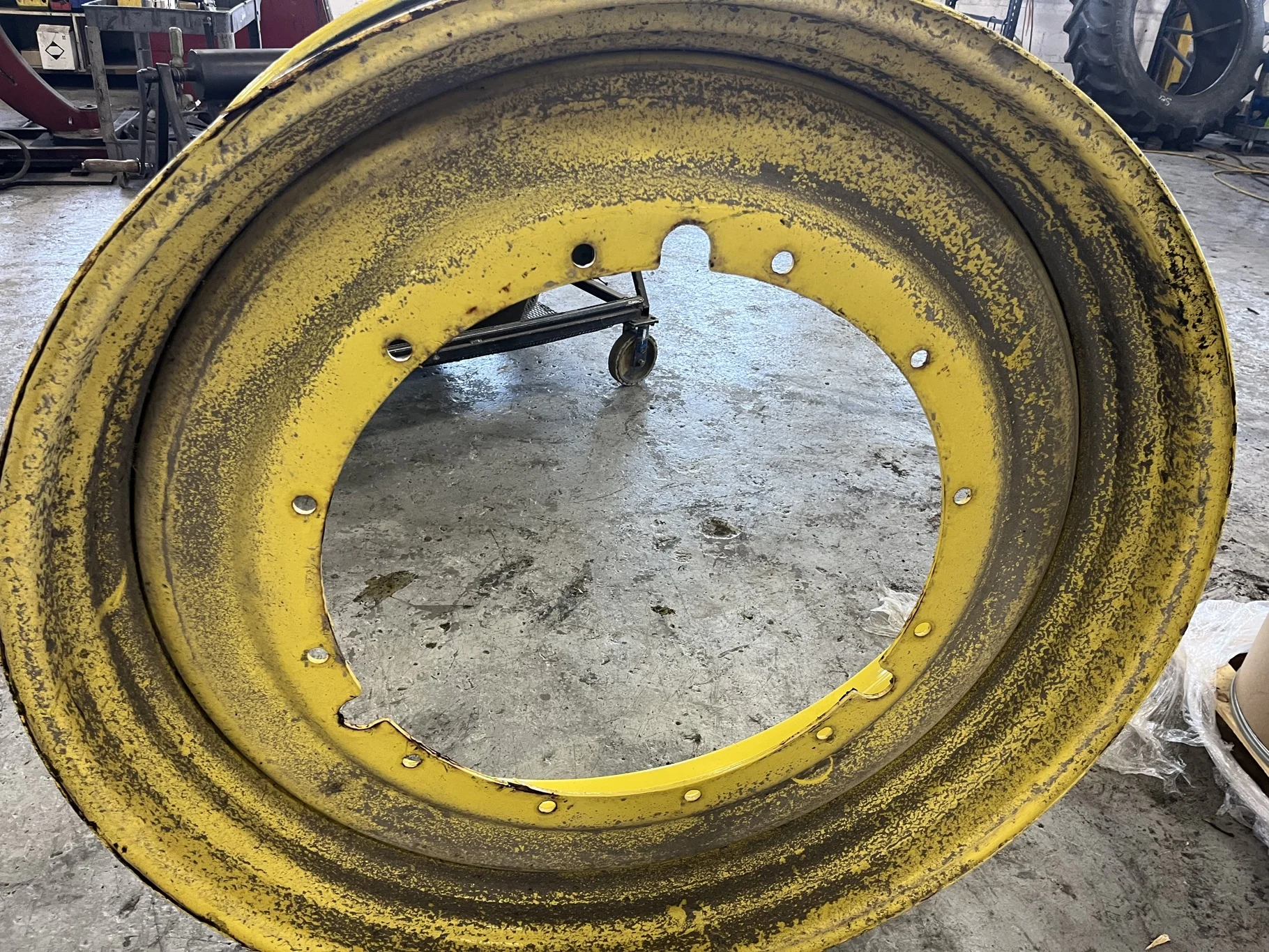 Used 15 X 50 12-32.047-30.079 Yellow Wheel
