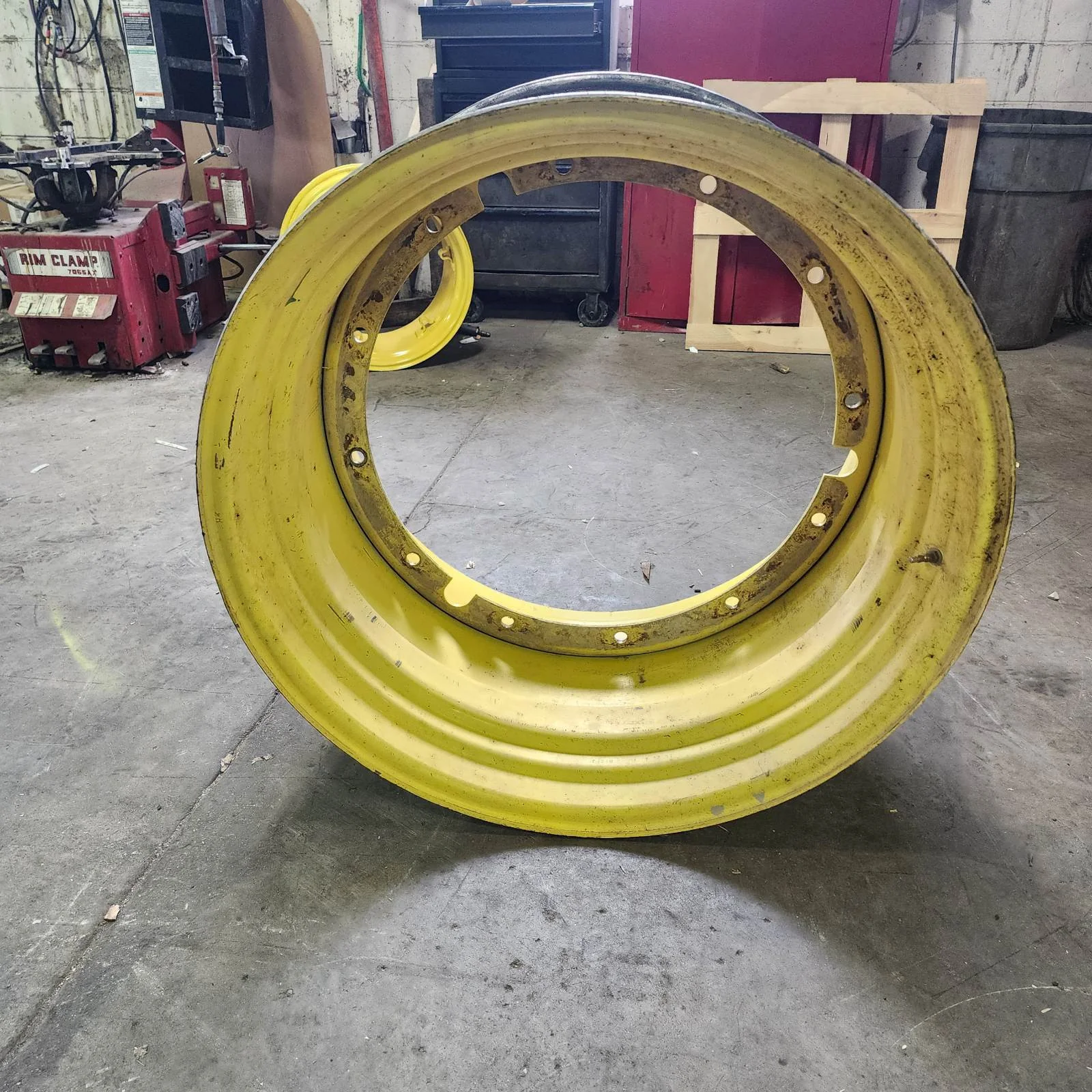 Used 23 X 38 12-32.047-30.078 9"BS Titan Rim & Rail Yellow Wheel