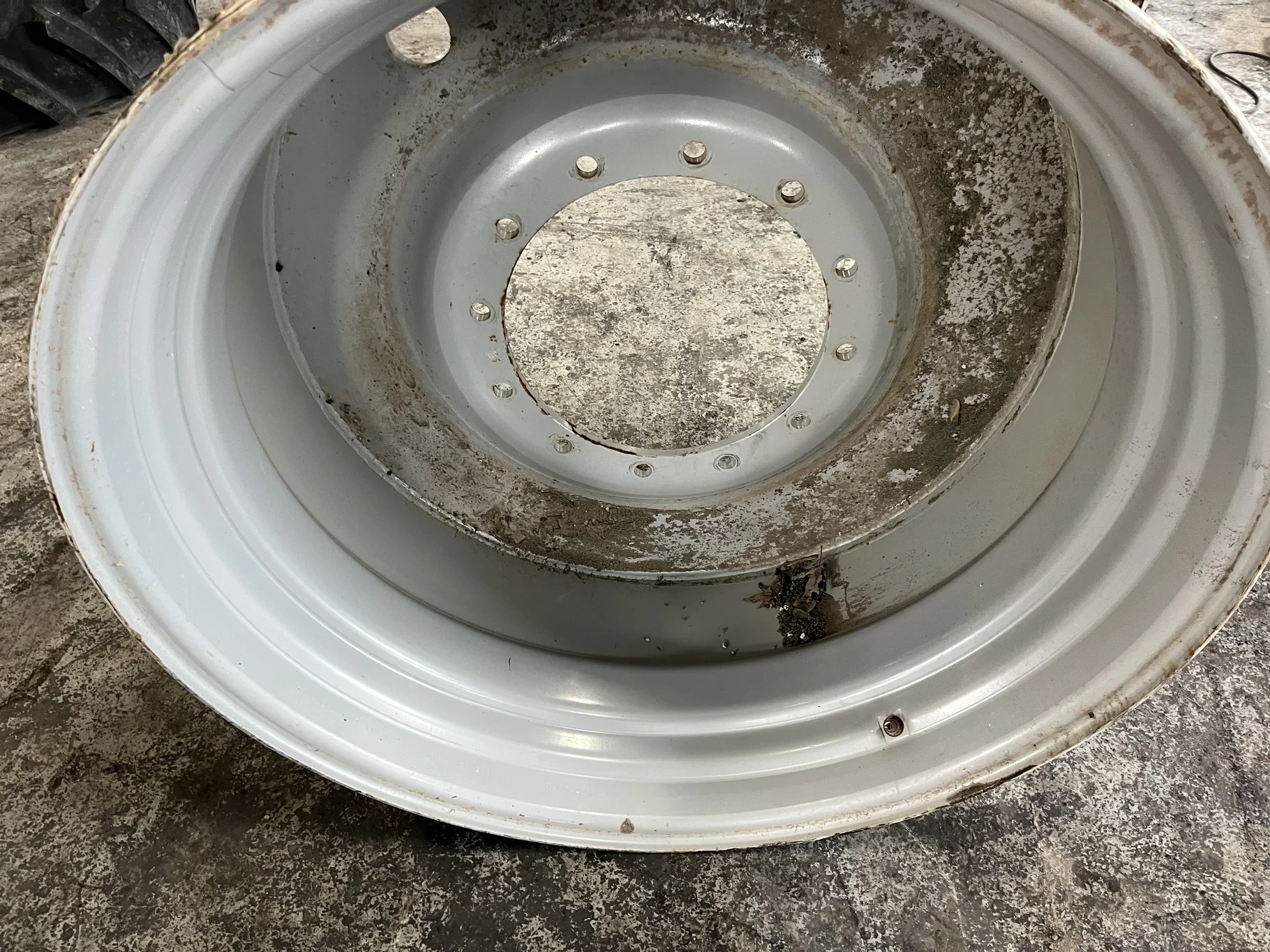 Used 23 x 38 12-16.732-14.62 (9.875BS) Agco Gray Wheel