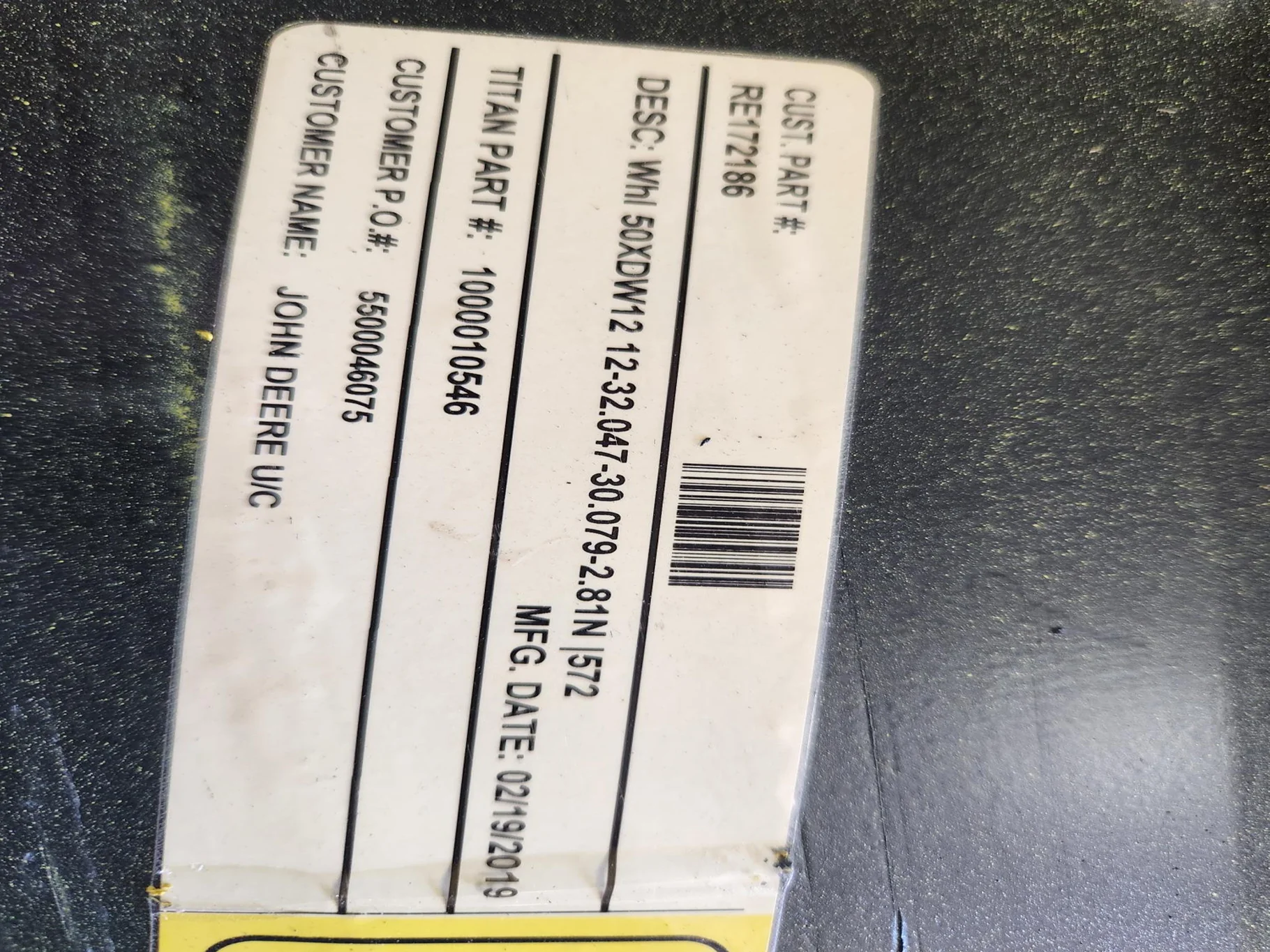 Used 12 x 50 12-32.047-30.079 Rim and Rail Yellow Wheel