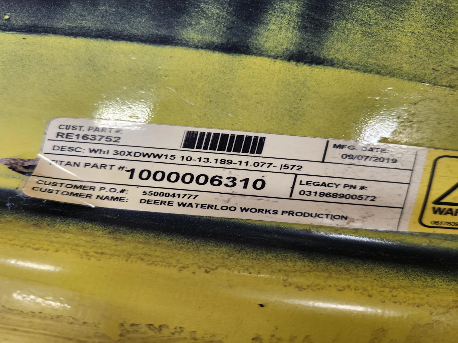 Used 15 x 30 10-13.189-11.077 Yellow Wheel