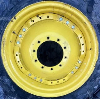 Used 15 X 34 24-29.25 (9.375" BS) 3 Bolt Waffle Wheel w/ 10-13-11 (.875) 4" Disc JD Yellow