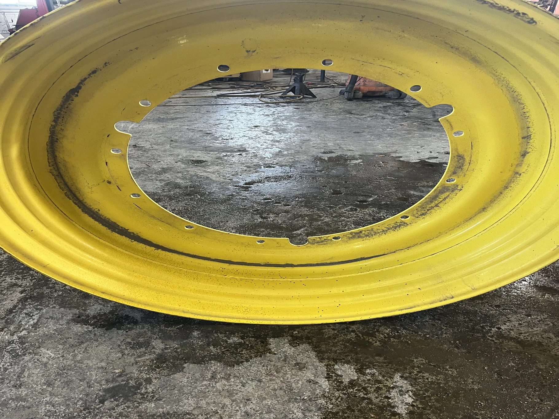 Used 15 X 50 12-32.047-30.079 -2.81IN Yellow Wheel