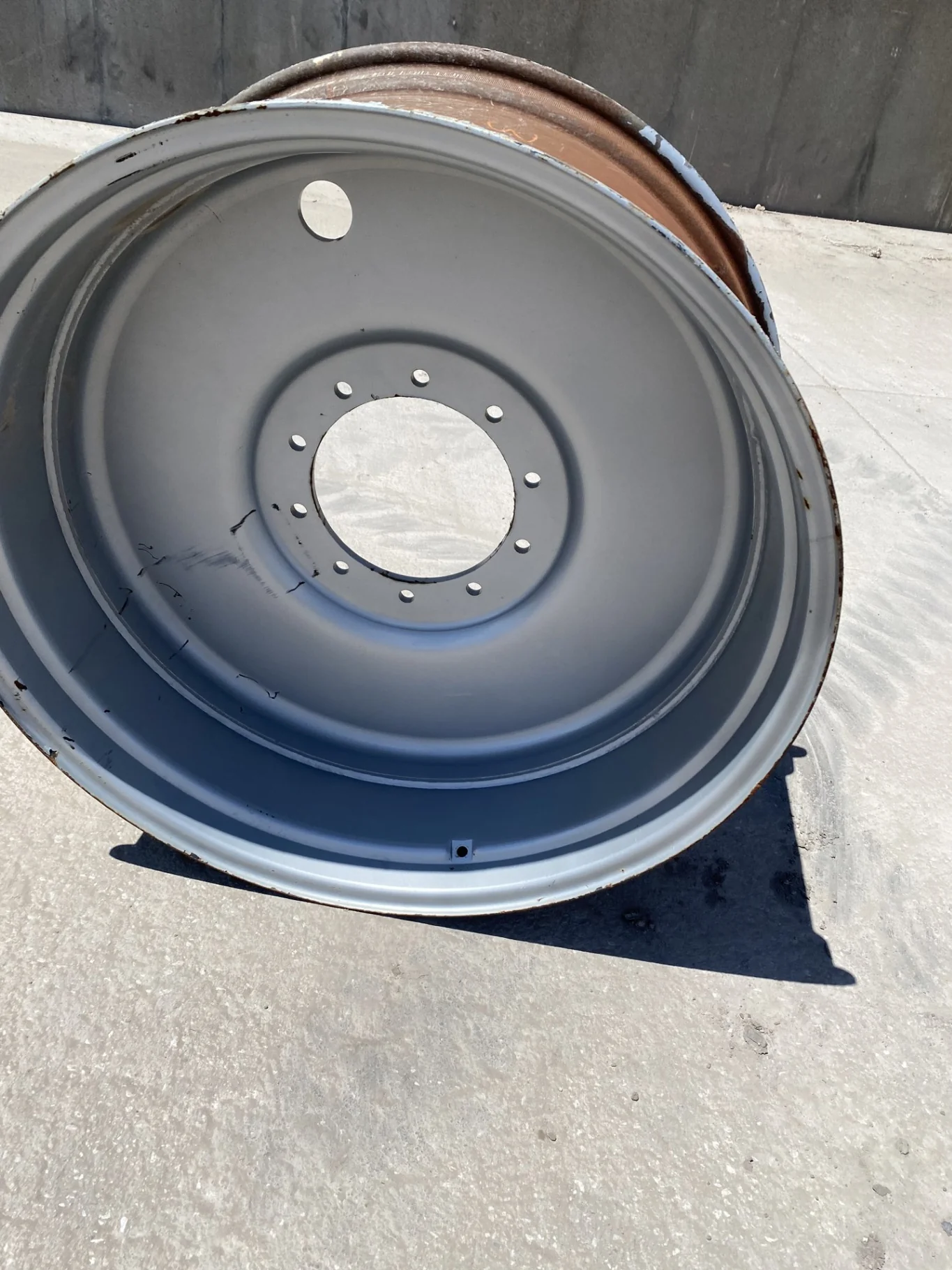 Used 18 X 38 (10-13-11) CIH Silver Wheel  (Gashes; rust; Chipped paint)