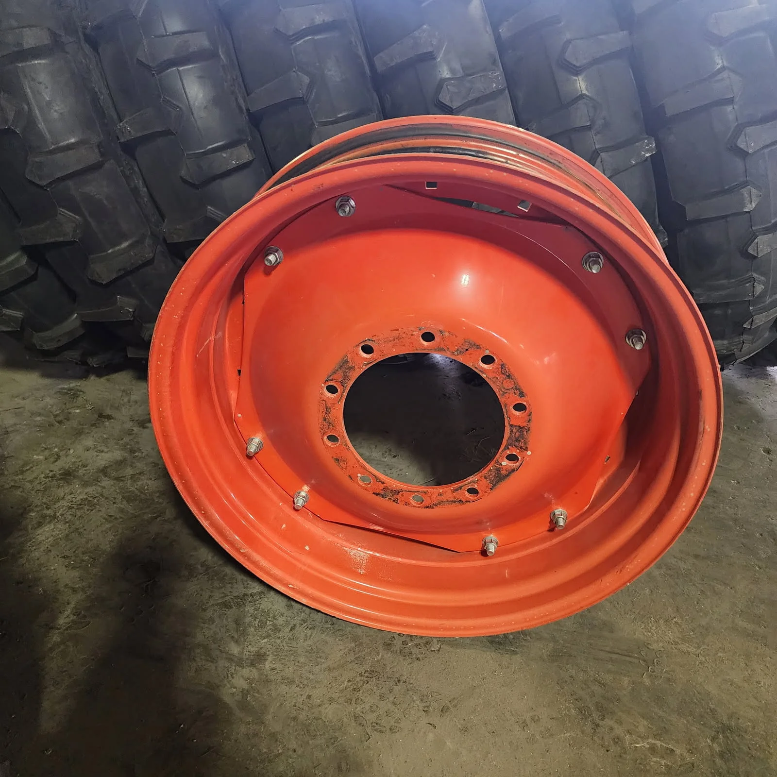 Used 10 X 34 10-13.19-11.07 8"BS Titan Waffle 2 Bolt Fendt Red Wheel w/ Disc