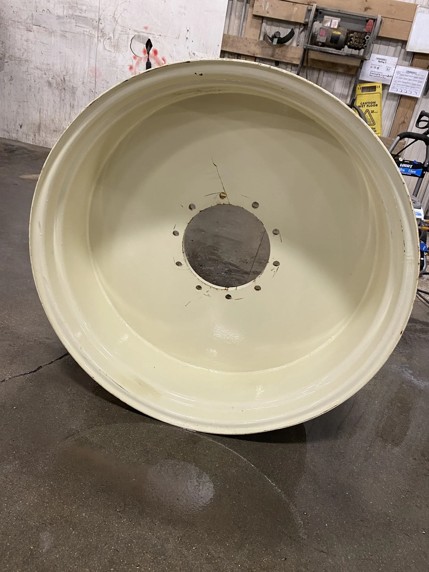 Used 18 X 38  Off White Grain Cart wheel  ( gashes, scratches, Rust)